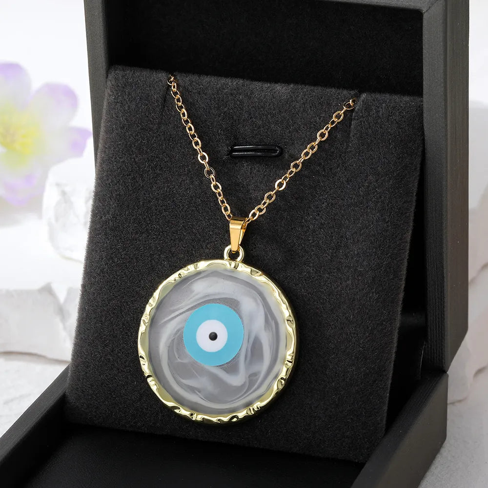 CELESTE EVIL EYE NECKLACE