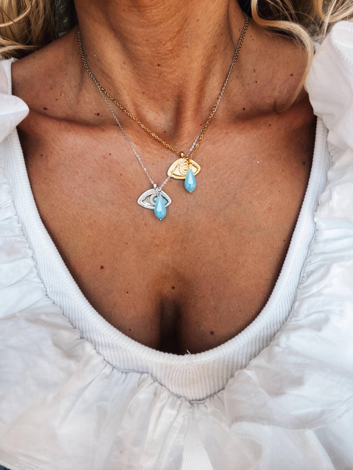 Evil  eye and blue drop