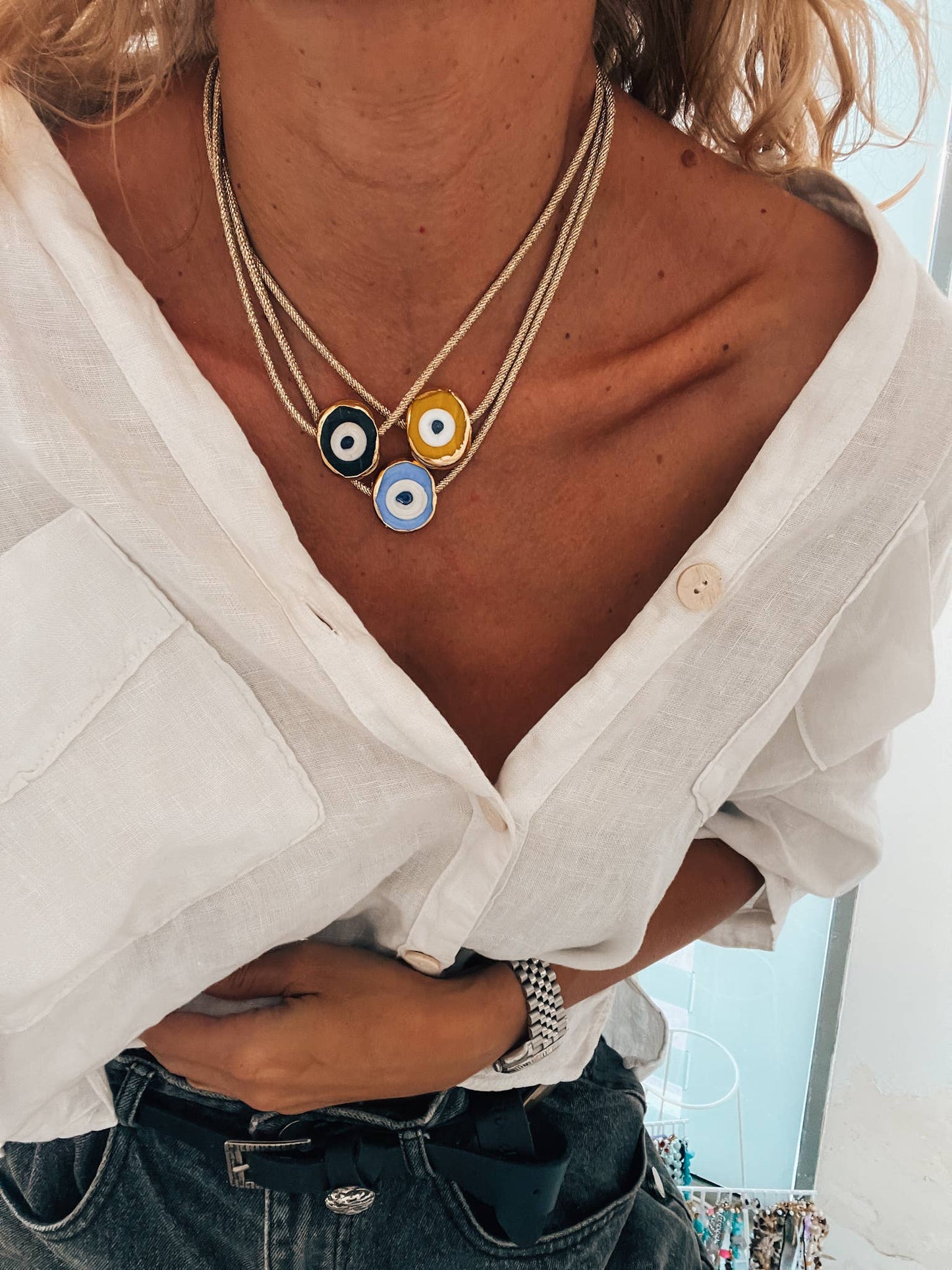 Chunky glass eye choker necklace on gold cord