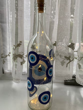 Load image into Gallery viewer, Evil eye Wine bottles