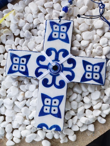 White cross with blue print
