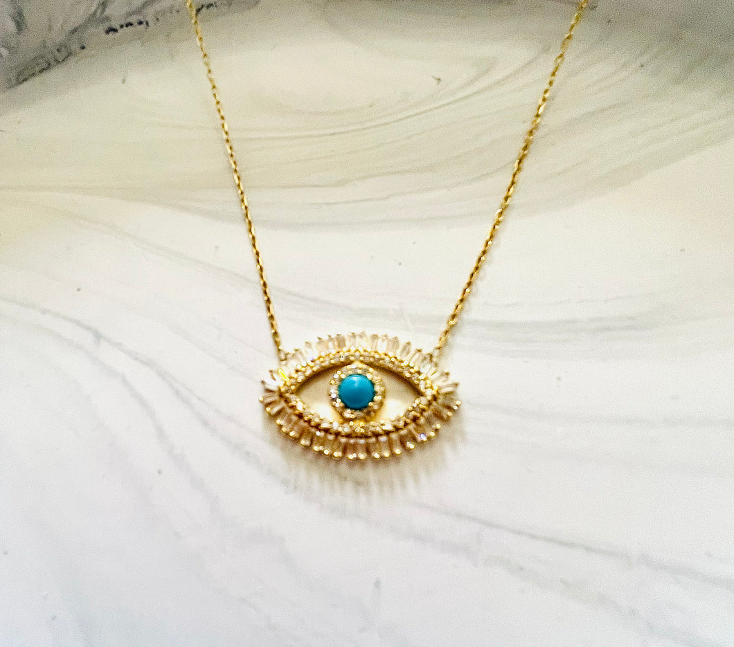Gold with turquoise stone